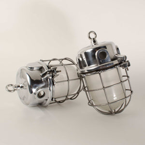 Pair of caged aluminium pendants