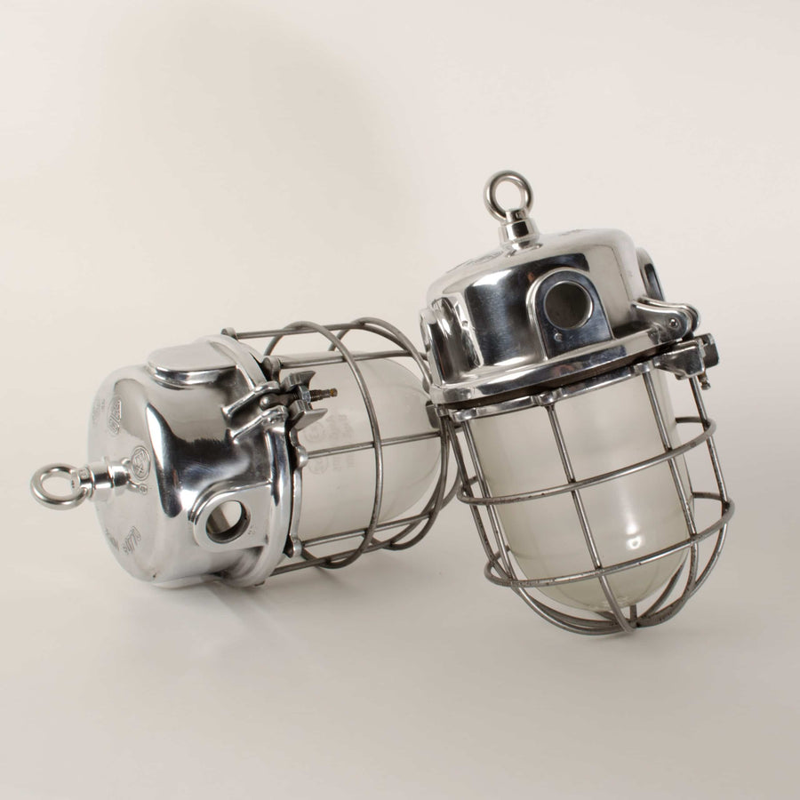 Pair of caged aluminium pendants